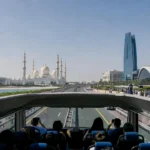 Abu Dhabi tour from Dubai showing Sheikh Zayed Mosque, Louvre Abu Dhabi, and Emirates Palace on a full-day sightseeing trip