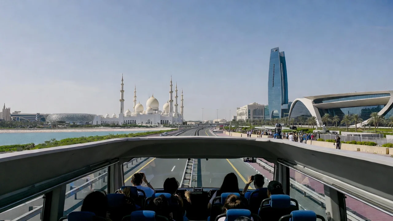 Abu Dhabi tour from Dubai showing Sheikh Zayed Mosque, Louvre Abu Dhabi, and Emirates Palace on a full-day sightseeing trip